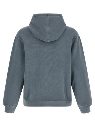Blue Carhartt Wip cotton sweatshirt with a crew neck and ribbed cuffs, displayed on a hanger.