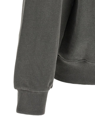 Black Carhartt Wip cotton sweatshirt with ribbed cuffs and crew neck, displayed on a hanger.
