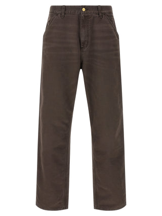 Brown organic cotton casual pants by Carhartt Wip, featuring a relaxed fit and natural fabric texture, suitable for everyday wear.