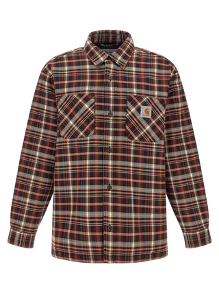 Red cotton patterned shirt by Carhartt Wip featuring a stylish design and button-up front, displayed on a hanger.