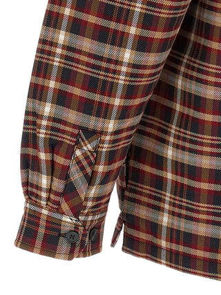 Red cotton patterned shirt by Carhartt Wip, featuring a casual fit and button-down design, shown on a hanger.