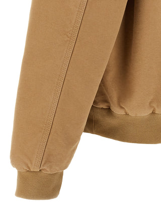 Beige Carhartt Wip cotton full-length jacket with front pockets and button closure, stylish and casual outerwear.
