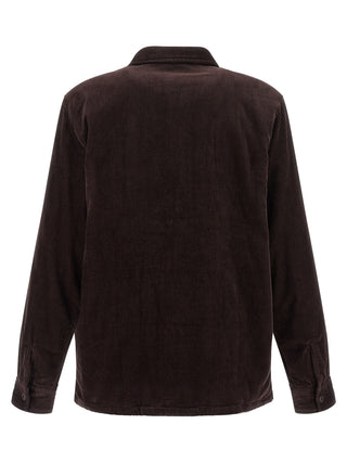 Carhartt Wip brown cotton jacket with a classic design, featuring a front zipper and adjustable cuffs on a plain background.