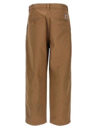 Beige Carhartt Wip cotton casual pants with relaxed fit and functional pockets, suitable for everyday wear.