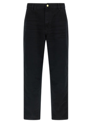 Black organic cotton straight-leg jeans by Carhartt Wip, showing front view with classic five-pocket design and belt loops.