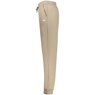 Beige cotton women's trousers by Norway 1963, tailored fit with classic design and side pockets, displayed on a hanger.