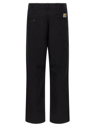 Carhartt Wip black polyester casual pants with relaxed fit and front pockets, suitable for everyday wear.
