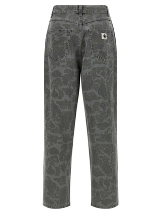 Gray organic cotton tapered jeans by Carhartt Wip, showing slim fit design and textured fabric.