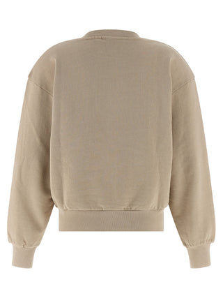 Beige Carhartt Wip cotton sweatshirt with a relaxed fit, crew neck, and ribbed cuffs displayed on a hanger.