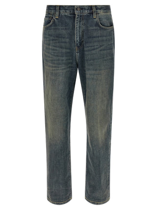 Gray Carhartt Wip cotton straight-leg jeans shown on a hanger, featuring classic five-pocket design and durable fabric.
