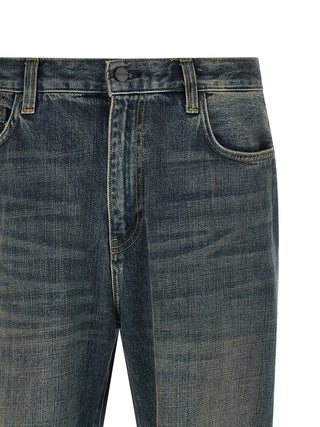 Gray Carhartt Wip cotton straight-leg jeans displayed on a hanger with front pockets and classic fit.