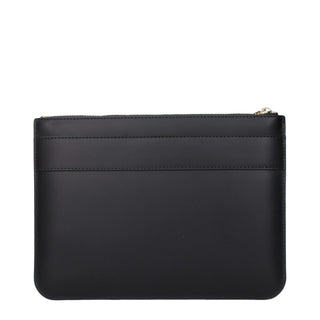 Black leather clutch bag by Comme Des Garçons, featuring sleek design and minimalist style, displayed on a clean background.