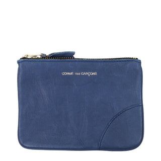 Blue leather wallet by Comme Des Garçons featuring a sleek design and compact size, perfect for everyday use.