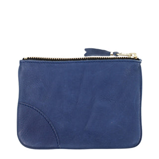 Blue leather wallet by Comme Des Garçons with card slots and minimalist design, shown open with visible stitching and branding.