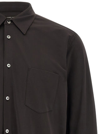 Comme Des Garçons bicolor polyester blouse with contrasting color panels and a clean, modern silhouette