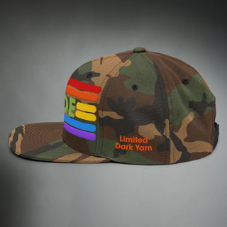 Dark Yarn Pride Camo Special Edition Snapback hat with camouflage pattern and flat brim, showcasing bold branding and vibrant colors.