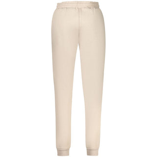 Beige cotton women's sweatpants by Norway 1963, casual relaxed fit with elastic waistband and soft fabric, full-length style.