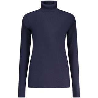 Woman wearing a navy blue viscose sweater by Norway 1963, featuring a relaxed fit and soft fabric.