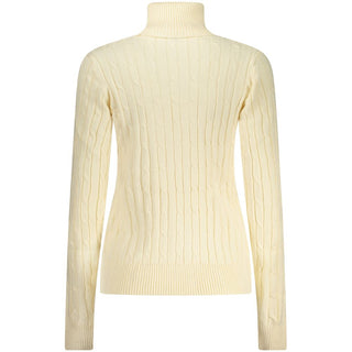 White viscose women's turtleneck sweater by Norway 1963, showing a cozy, fitted knit top with a high neckline.