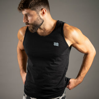 Dark Yarn PrimeCore™ men’s premium tank top, lightweight and breathable, shown in black with sleeveless design and athletic fit.