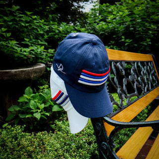 Dark Yarn Nautilus Reserve Dockside Cap, navy blue headwear with adjustable strap and embroidered logo, casual nautical style.