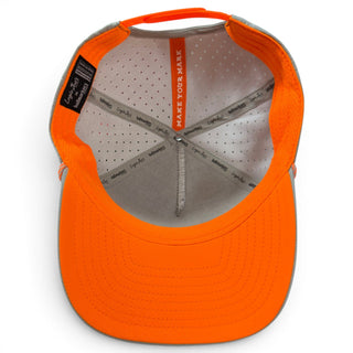 Logie Joe's Golf Fossil Fairway snapback hat with built-in magnetic ball marker holder and adjustable strap.