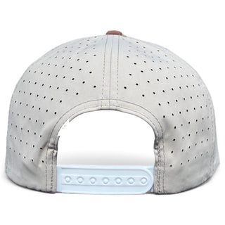Orangutan Golf Hat by Logie Joe's Golf featuring a tan snapback cap with built-in magnetic ball marker holder and adjustable strap.